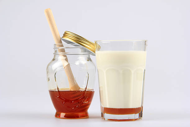 istock Jar Of Honey And Milk -two 469752623
