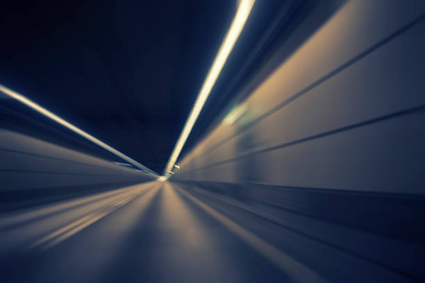 istock car lights on highway by night 469753574