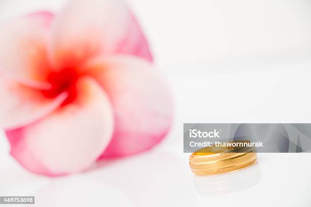Wedding Ring With Plumeria Flower Stock Photo - Download Image Now - 2015, Anniversary, Beautiful People