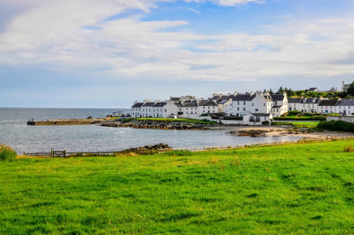 View of harbour and town Port Charlotte on Isle of Islay, Scotland