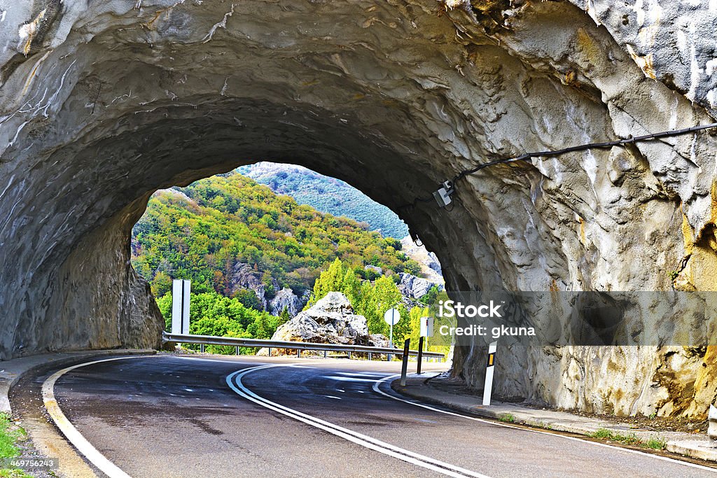 Tunnel Winding Paved Road in the Cantabrian Mountain, Spain Asphalt Stock Photo