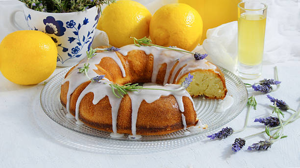 Lemon Cake with homemade limoncello and lavander Lemon Cake with homemade limoncello and lavander pound cake stock pictures, royalty-free photos & images