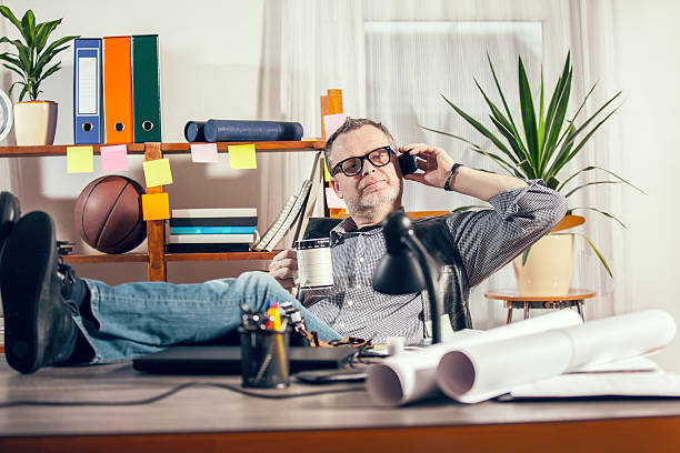 istock Old fashioned photographer working in his office 469757636