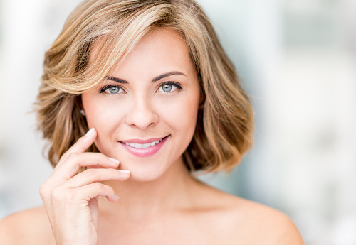 Beautiful portrait of a Caucasian woman with short hair and smiling