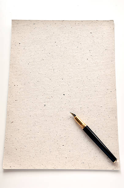 istock Handmade paper with a pen 469758602