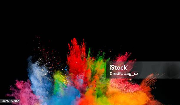 Colored Dust Explosion On Black Background Stock Photo - Download Image Now - Color Image, Exploding, Creativity