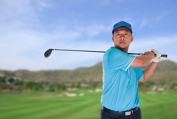 istock Golfer hits an fairway shot 469760865