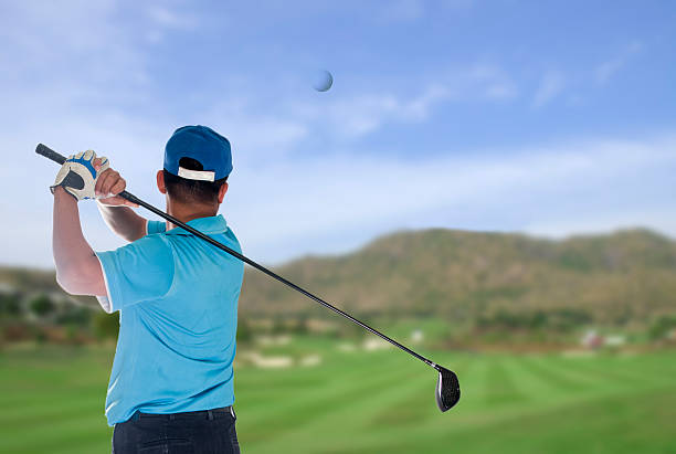 istock Golfer hits an fairway shot 469760899