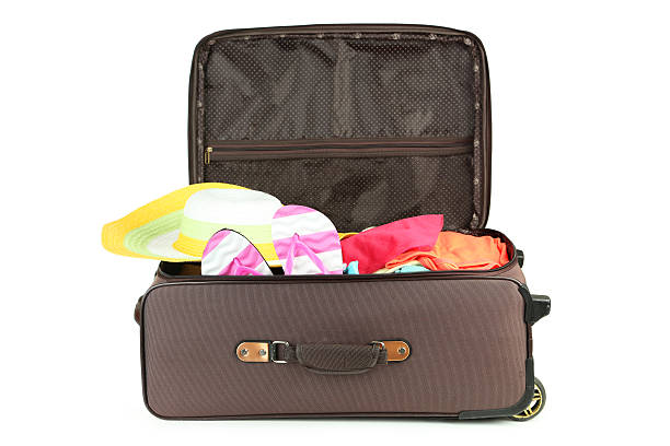 istock Suitcase with full of clothes 469767478