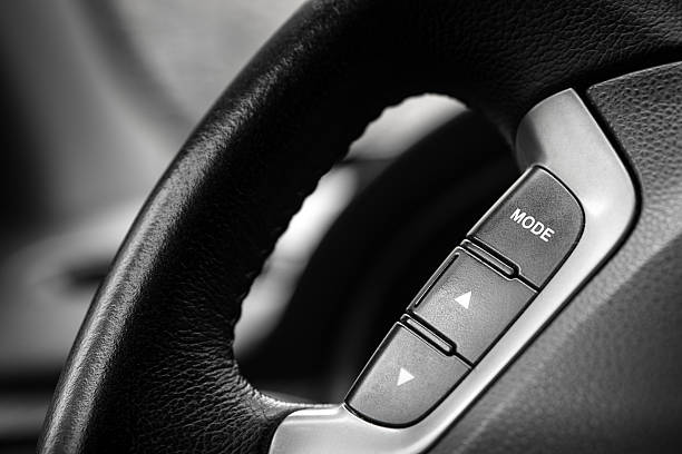 istock Driving wheel with music media buttons 469768422