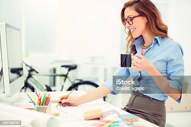 Female Interior Designer Sketching At Work Stock Photo - Download Image Now - Engineer, Desktop PC, Cheerful