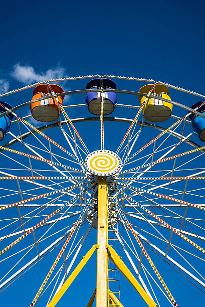 istock Yellow Big Ferris Wheel in Attraction Park 469769210