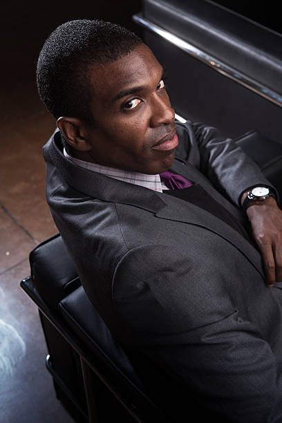 istock Handsome Young Businessman Posing on Sofa 469777820