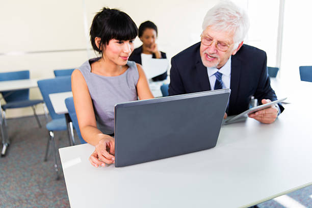 istock Business people in education room talking about their problems 469777912