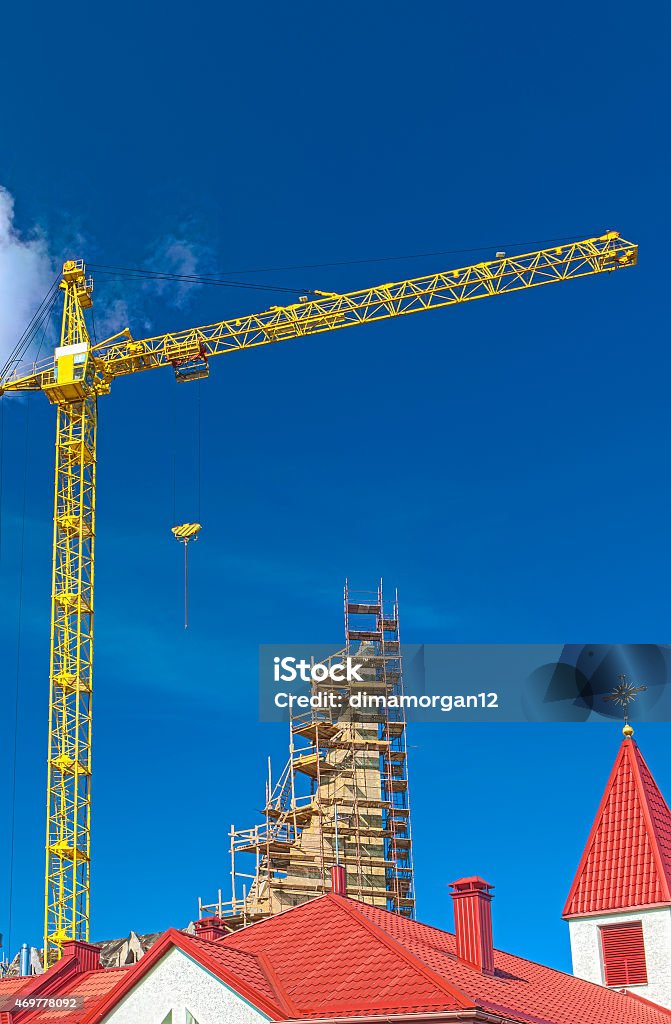 Building Construction Site Using High Crane. HDR Toning Image Building Construction Site Using High Crane. HDR Toning Image. Vertical Image Composition 2015 Stock Photo