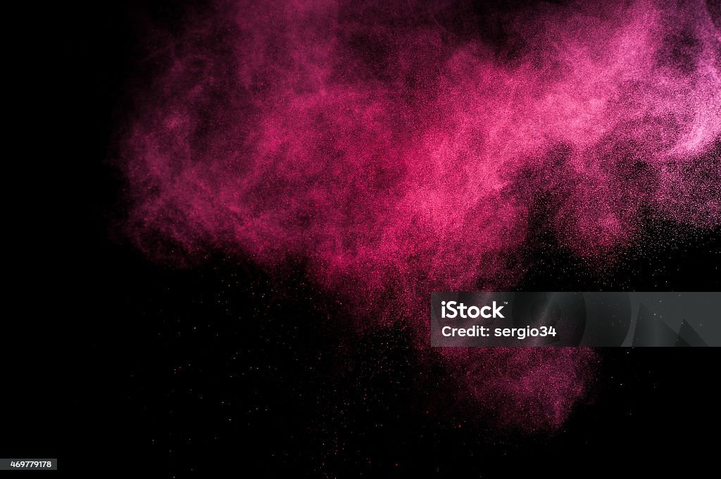 Abstract red and pink paint Holi. Abstract red and pink paint Holi. Abstract red and pink powder explosion on black background. Pink Color Stock Photo