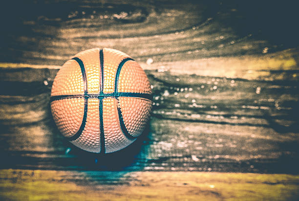 istock the balls on a wooden floor with light effect 469781710