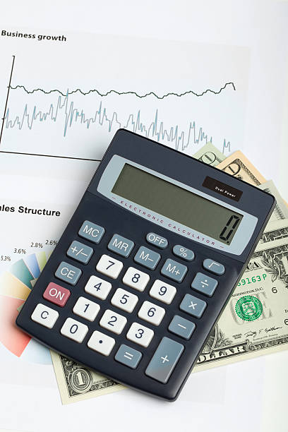 istock USA dollar money banknotes and calculator 469782982