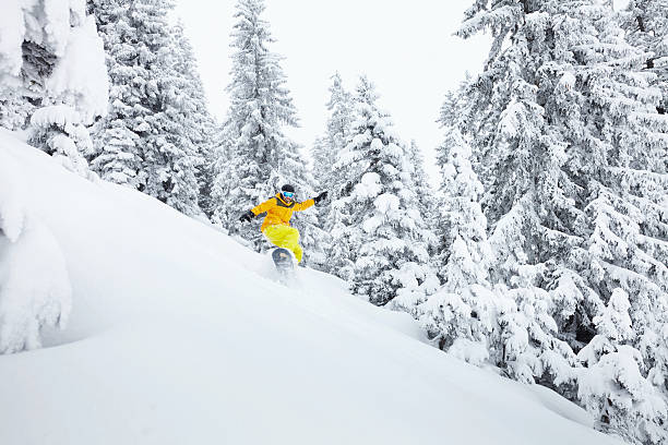 istock Freeride snowboarder on ski slope 469783768
