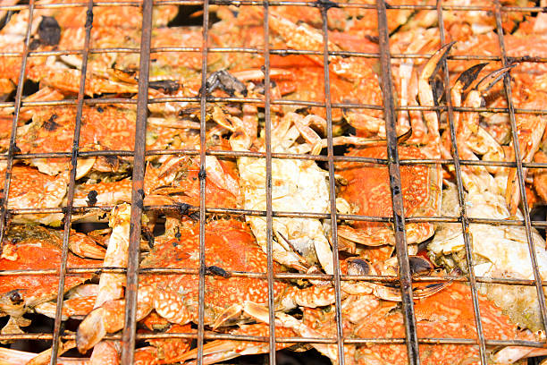 istock Grilled crab on flaming grill. 469787248
