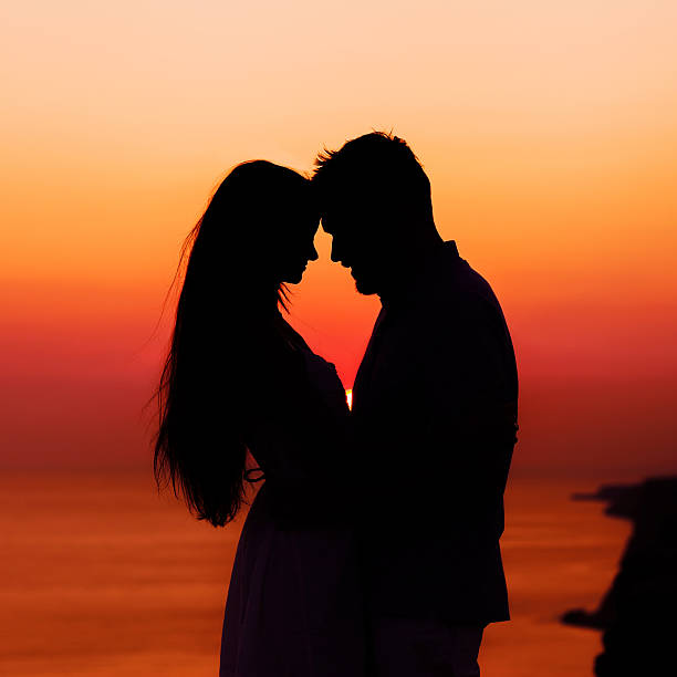 istock silhouette couple in love 469788597