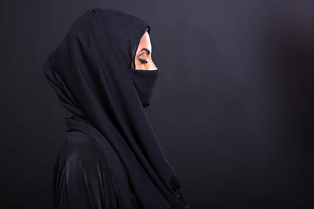 istock arabian woman with eyes closed 469789461