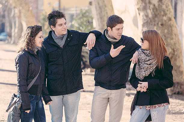 istock Group of Friends Talking Outside 469789961