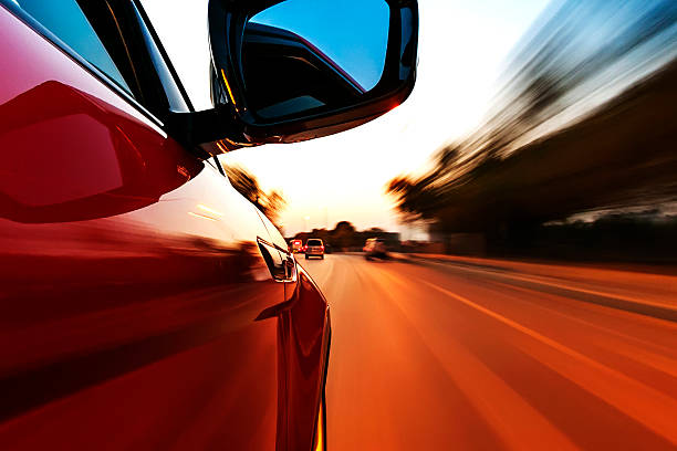 istock car on the road with motion blur background. 469791887