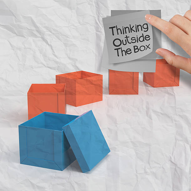 istock thinking outside the box on crumpled sticky note paper 469792555