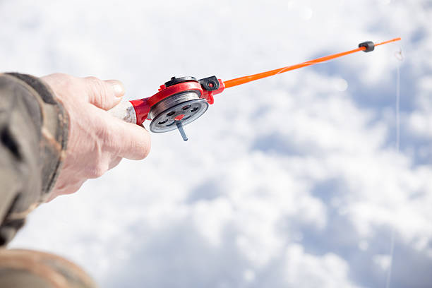 Man On Winter Fishing Rod With Small Stock Photo - Download Image Now -  2015, Activity, Catching - iStock