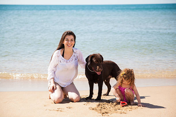 istock Happy family at the beach 469793010