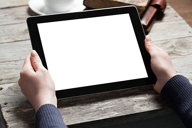 istock A photograph of 2 hands holding a tablet computer 469793376
