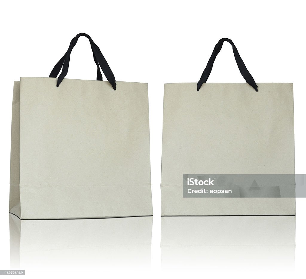 Brown paper bag Brown paper bag on reflect floor and white background Bag Stock Photo