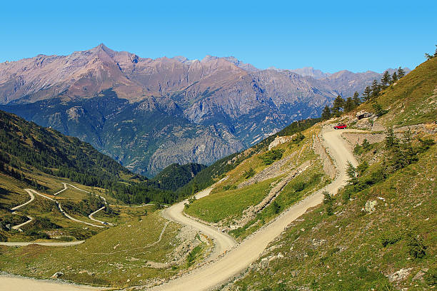 istock Unpaved road among mountains. 469797993
