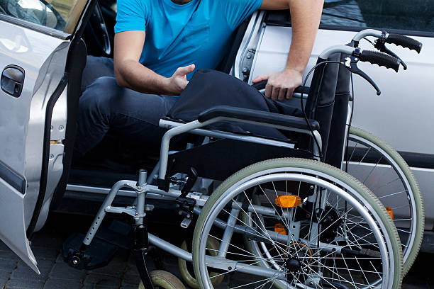 istock Disabled driver consisting his wheelchair 469798593