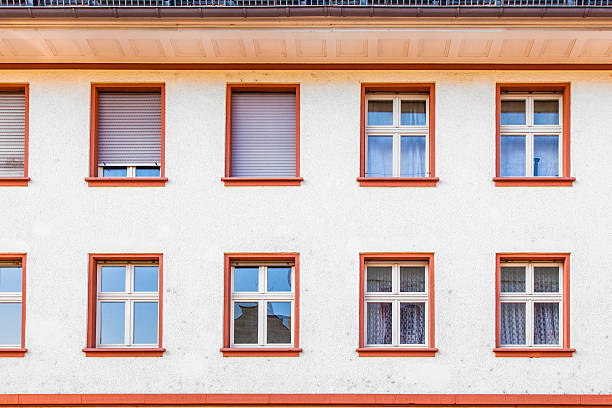 istock facade of an old house with windows in a row 469798983