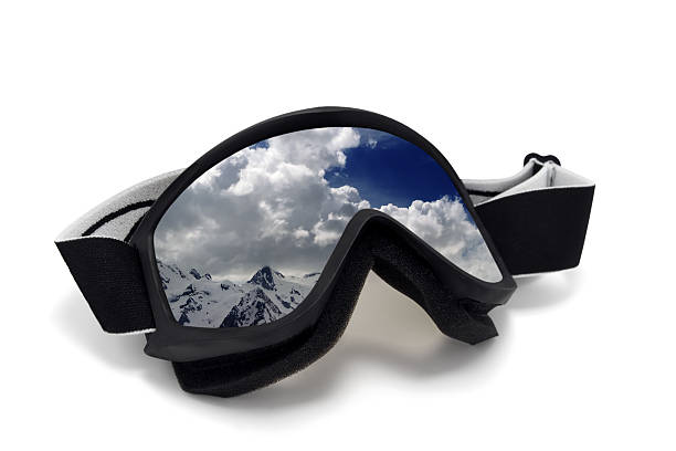 istock Ski goggles with reflection of cloudy mountains 469799066