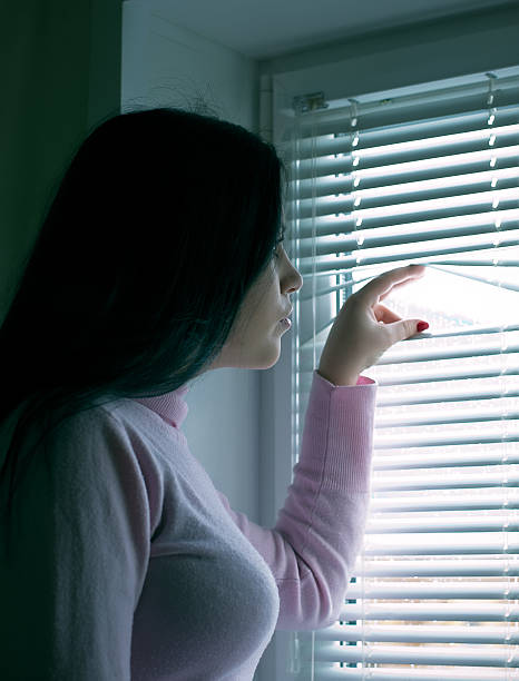 istock Alarmed by girl at the window 469799121
