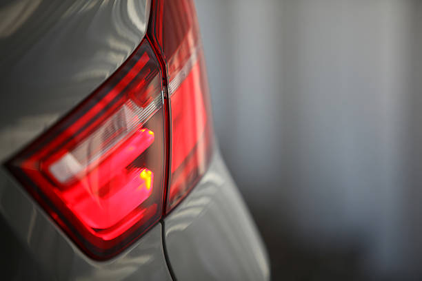 Rear light Detail on the rear light of a car. tail light stock pictures, royalty-free photos & images