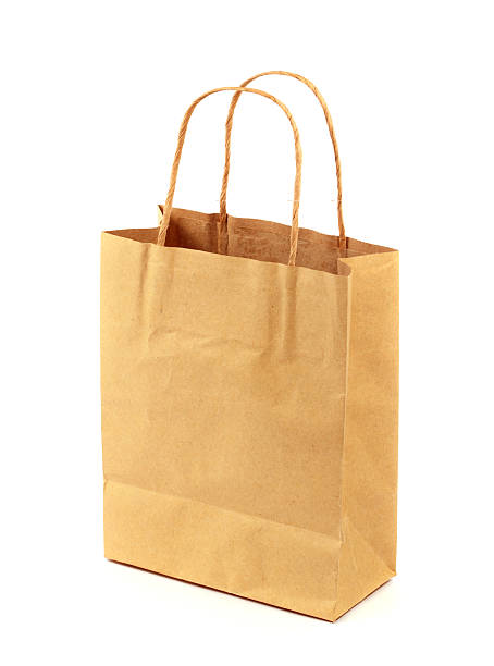 istock blank brown paper bag isolated on white background 469800523