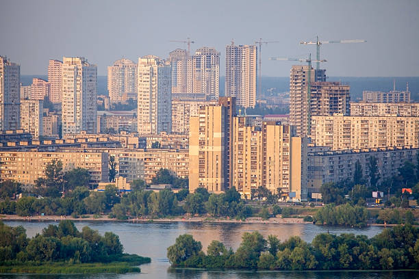 New residencial district in Kyiv city. View of the new residencial district in Kyiv city on the bank of the Dnieper River. level luffing crane stock pictures, royalty-free photos & images
