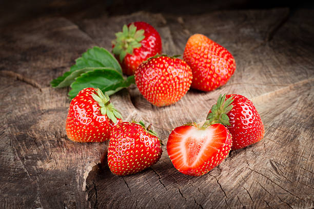 istock Fresh organic strawberries on wood 469806956