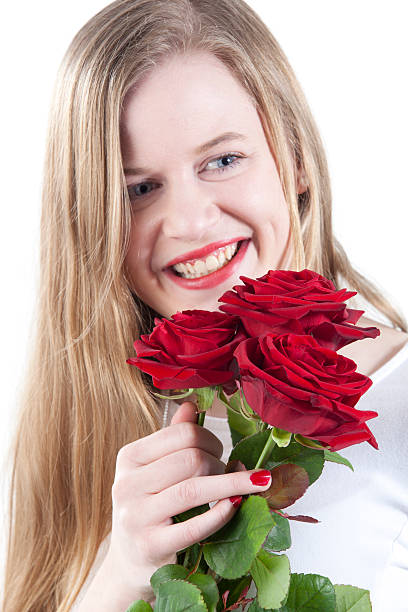 istock Woman with red roses.GN 469808517