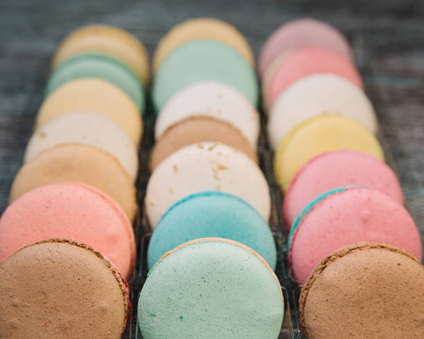 istock French colorful macarons on wood table 469810136