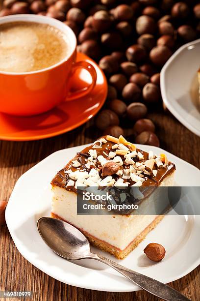 Cheesecake With Nuts On Plate Stock Photo - Download Image Now - Animal Egg, Baked, Baked Pastry Item