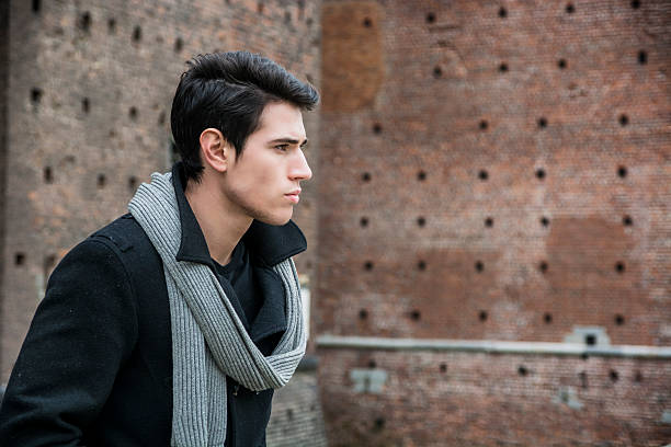 istock Young Man Outside the Building Looking to Right 469811264