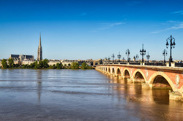 istock Bordeaux river bridge with St Michel cathedral in background 469815935
