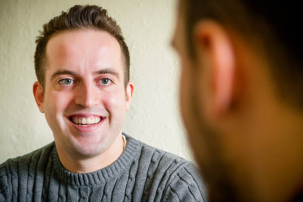 istock Male Client Talking and Responding to his Life Coach 469816100
