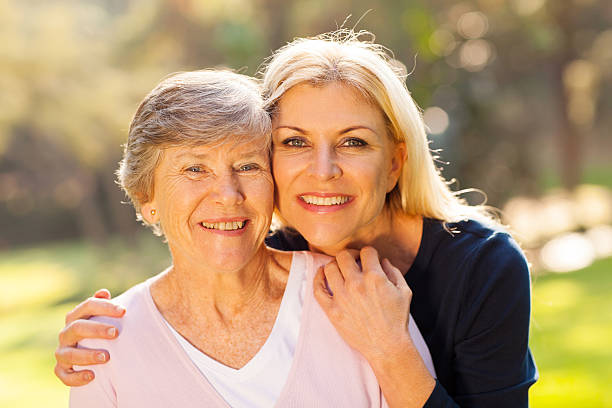 istock senior woman and middle aged daughter 469816901