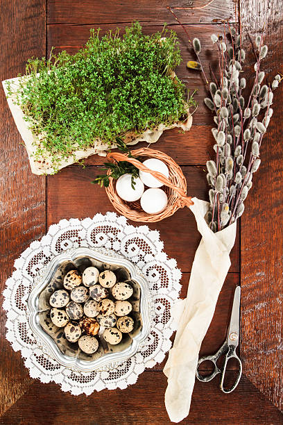 istock Easter composition of catkins, eggs and cress on wooden table 469819246